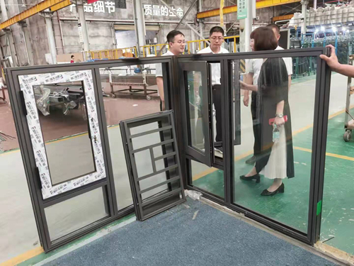 热烈欢迎山东华建铝业集团到富轩总部探访交流！